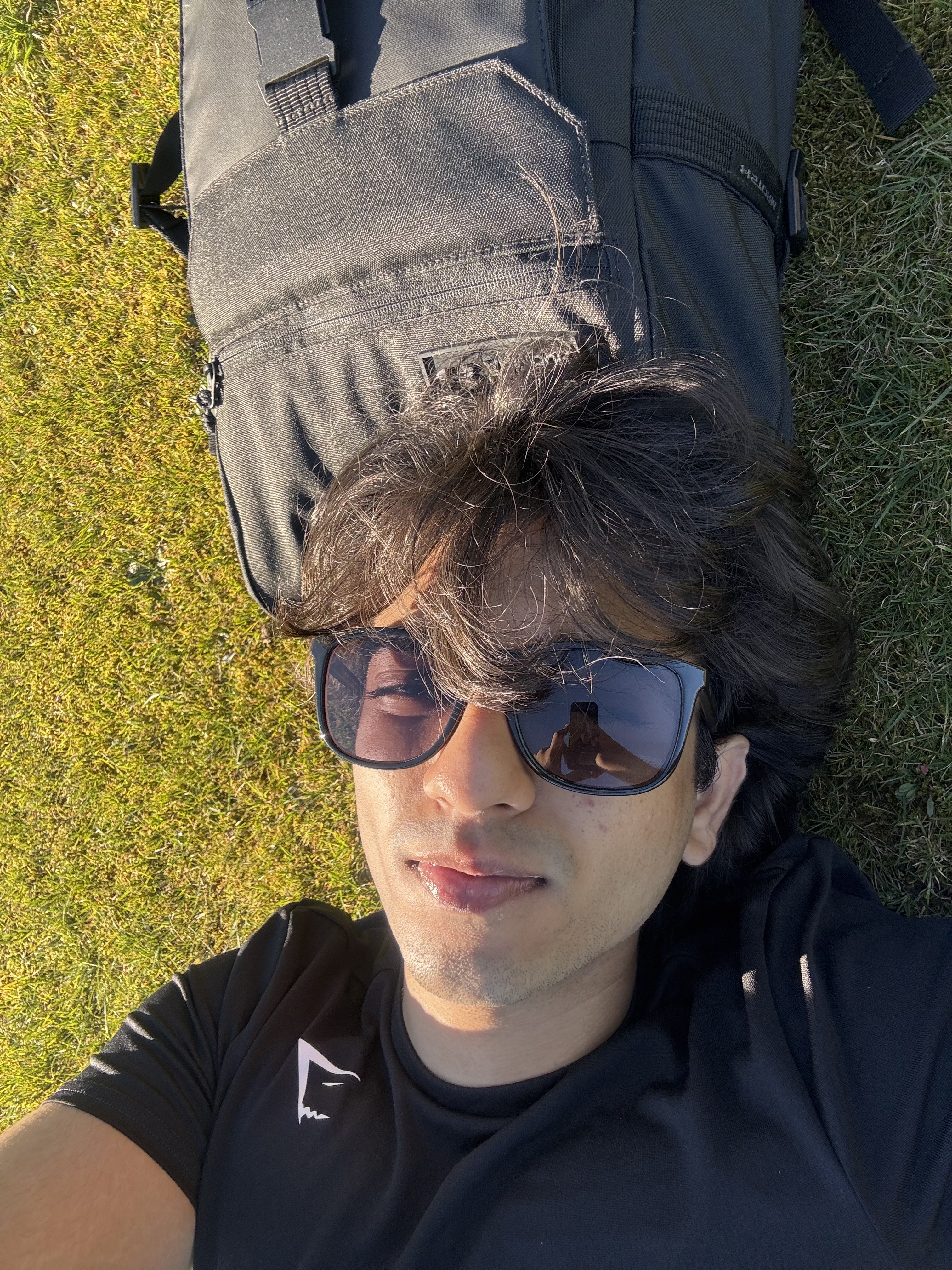 Aadi lying on grass